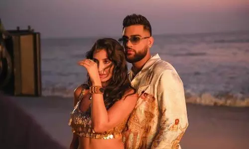 ग्लोबल सेंसेशन नोरा फतेही ने आए हाए के सेट पर करण औजला के साथ पंजाबी में बात करते हुए एक मजेदार बीटीएस क्लिप साझा की